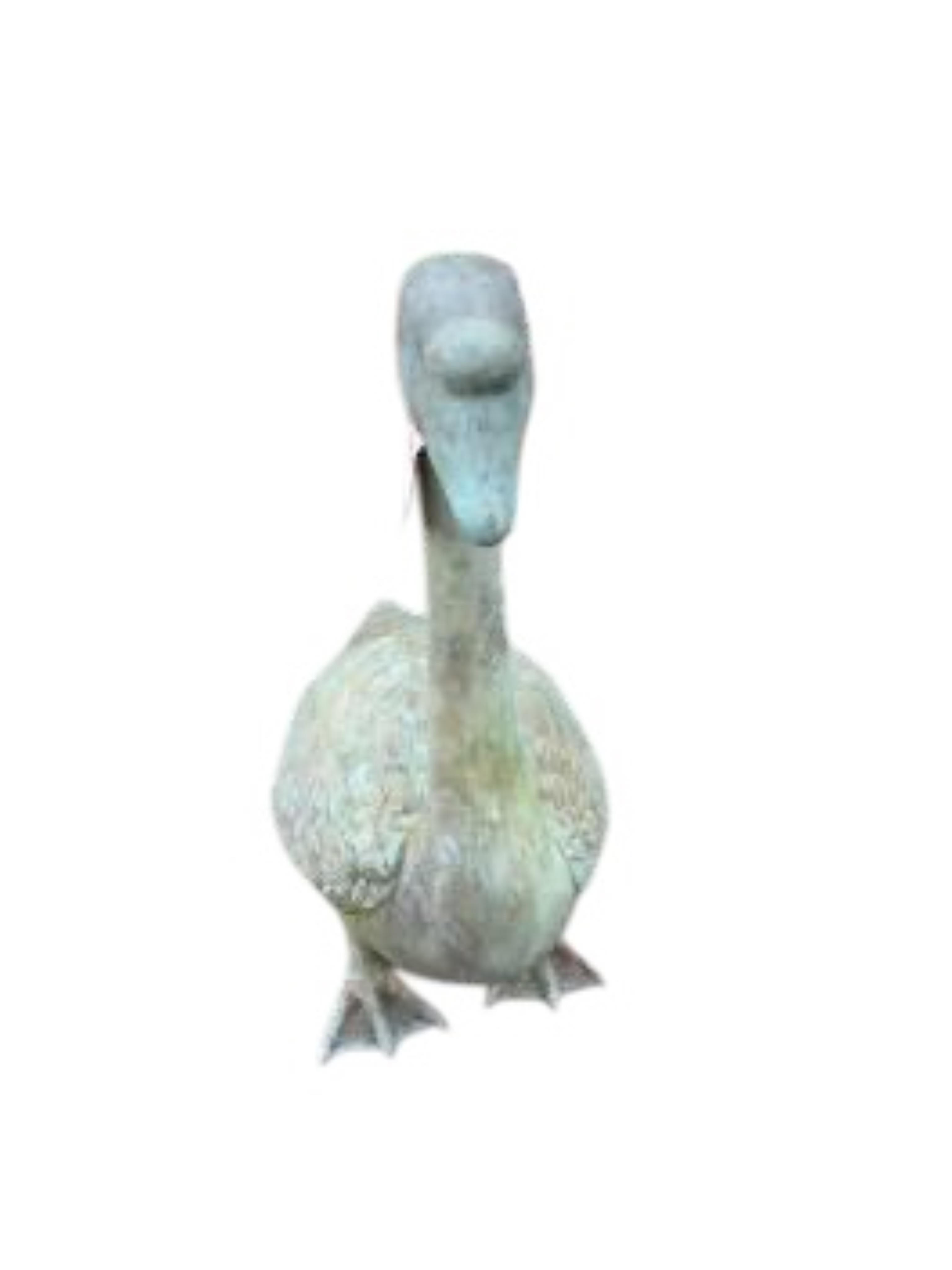 A cast patinated metal model of a goose, height 76cm
